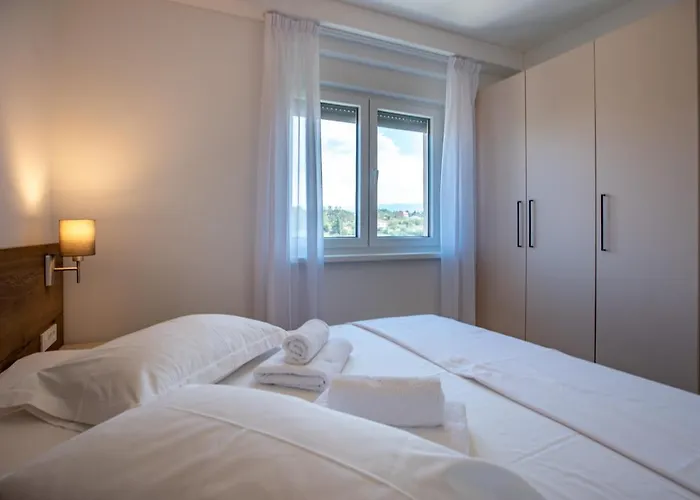 Hotel de apartamente B&m Rab-lopar